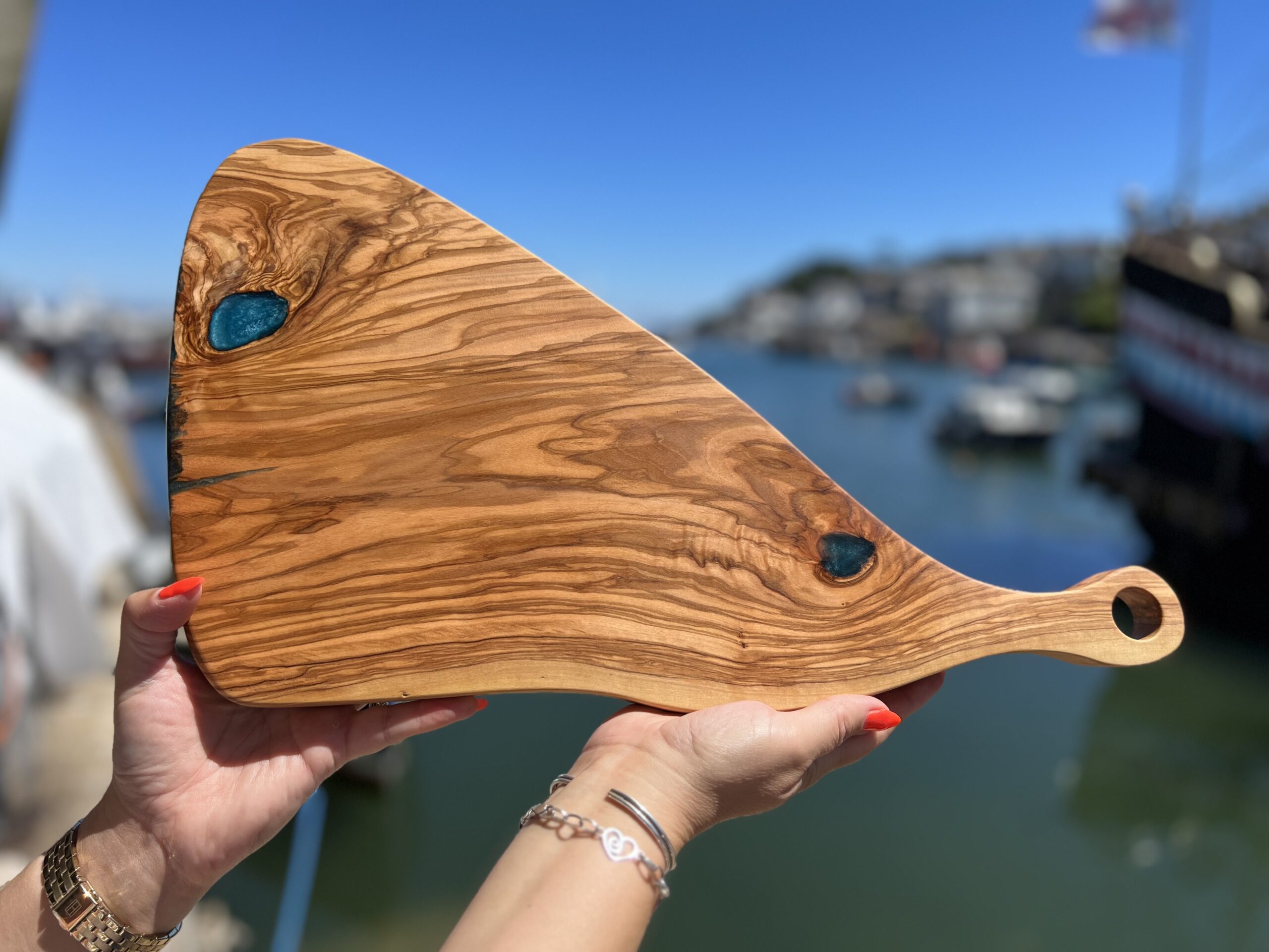 Handcrafted natural solid wood serving/chopping board, adorned with full-depth resin pour, functional artwork, made in Brixham, Devon by Mackerel Works