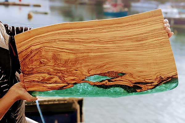 Unique, handcrafted natural solid wood serving/chopping board, adorned with stunning full-depth resin pour, functional artwork, made in Brixham, Devon by Mackerel Works